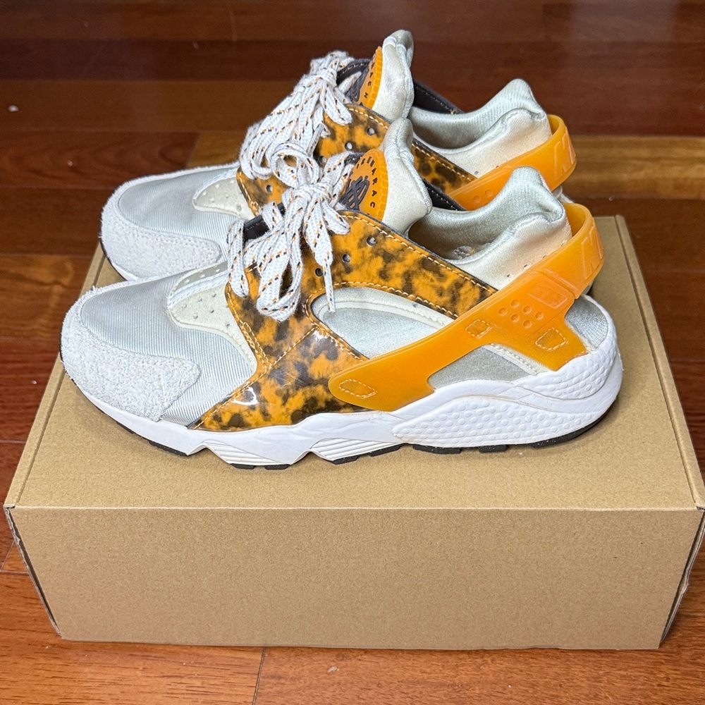 Nike Huarache Women's Sneakers in Orange and White